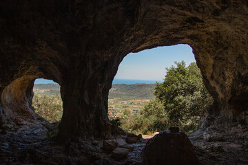 Black cave with two holes on the Zakynthos island