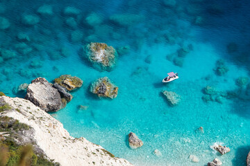 coral reef and boat in the sea on the Zakynthos island 
