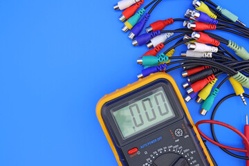 A digital multimeter for measuring the parameters of electrical circuits in an electrical diagram....