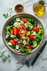 top down view on greek salad in a bowl on the table healthy eating