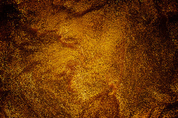 abstract glitter black and gold lights background. de-focused