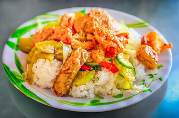 asian vegetarian dish with rice on plate