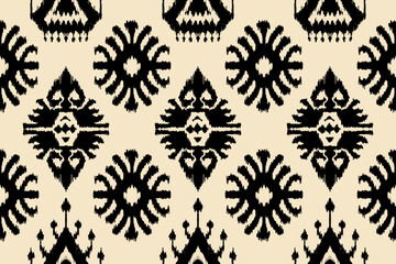 Ikat paisley embroidery on the fabric in Indonesia,India and asian countries.geometric ethnic oriental seamless pattern.Aztec style. illustration.design for texture,fabric,clothing,wrapping,carpet