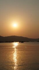 Naklejka premium Phu Quoc Vietnam beach view to sunset ocean with mountains