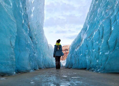girl walking on the glacier 