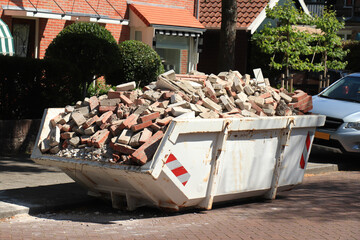 Garbage Dumpster near a construction site