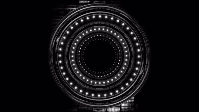 Circular light bulb array with round truss elements, 3D stage with light chase modes. Seamless VJ Loop in black and white.