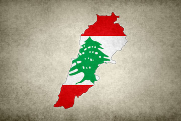 Map of Lebanon with its flag on a paper