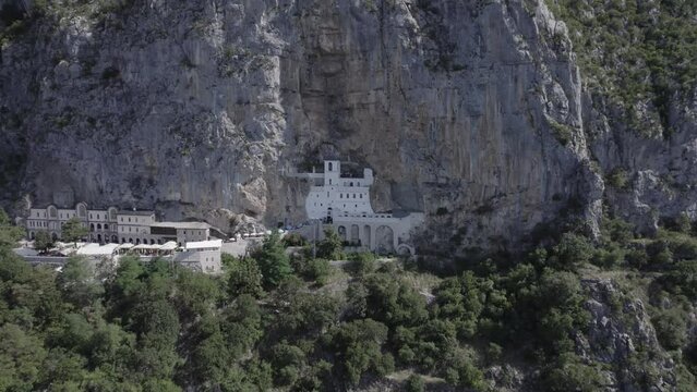 Drone shot flying around the Ostrog Monastery in Montenegro