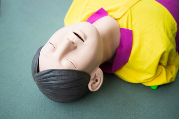 Paramedic class training simple props abstract concept . human shaped doll used to improve the...