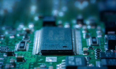 Closeup of Printed Circuit Board with processor, integrated circuits and many other surface mounted...