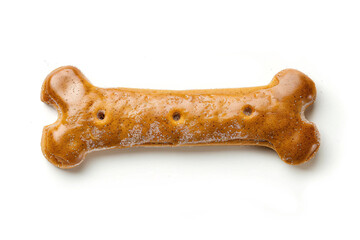 a dog bone shaped cookie on a white surface