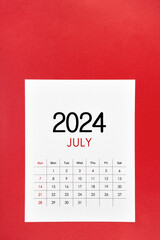 July 2024 calendar page with push pin on red