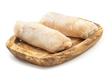 two raw fish fillets on a wooden plate