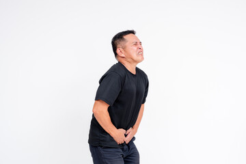 Fototapeta premium Middle-aged Asian man in discomfort holding his bladder isolated on white background