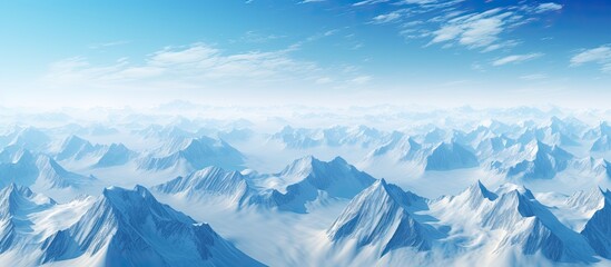 Fototapeta premium A breathtaking aerial perspective of Greenland reveals the majestic snow capped mountains offering an enchanting copy space image