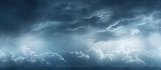 Obraz premium A background image of the cloudy and stormy sky preceding rain. Creative banner. Copyspace image