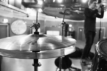 Black and white closeup of a hi-hat on a drumkit