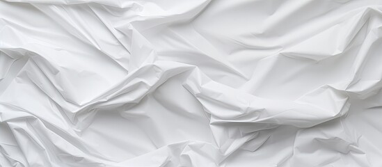 Obraz premium An abstract background with a crumpled white paper provides a blank space for adding text or images. Creative banner. Copyspace image
