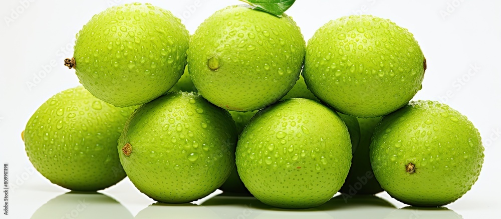 Poster fresh spondias dulcis fruit with a vibrant green color showcased on a clean white background providi