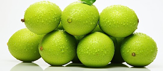 Fresh Spondias dulcis fruit with a vibrant green color showcased on a clean white background providing ample copy space for your use