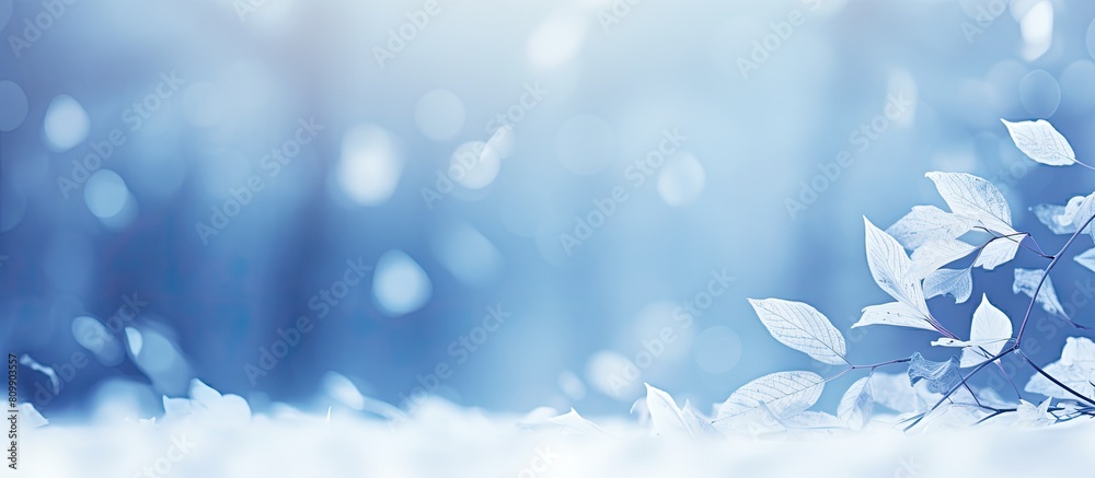 Leinwandbilder abstract blurred snowy winter background with glowing leaf backdrop and snowflakes perfect for copy 