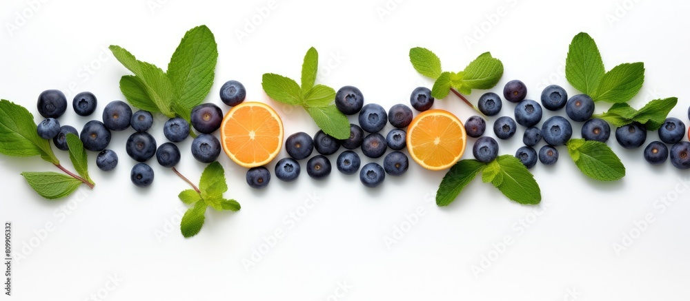 Poster Top view of apricot blueberries and mint leaves arranged on a white background creating a refreshing and vibrant copy space image Ideal for food backgrounds health conscious individuals superfood ent