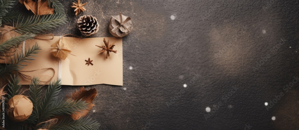Poster Nature inspired New Year concept with a flat lay composition featuring tree branches adorned with paper card notes creating a Christmas themed background with copy space image