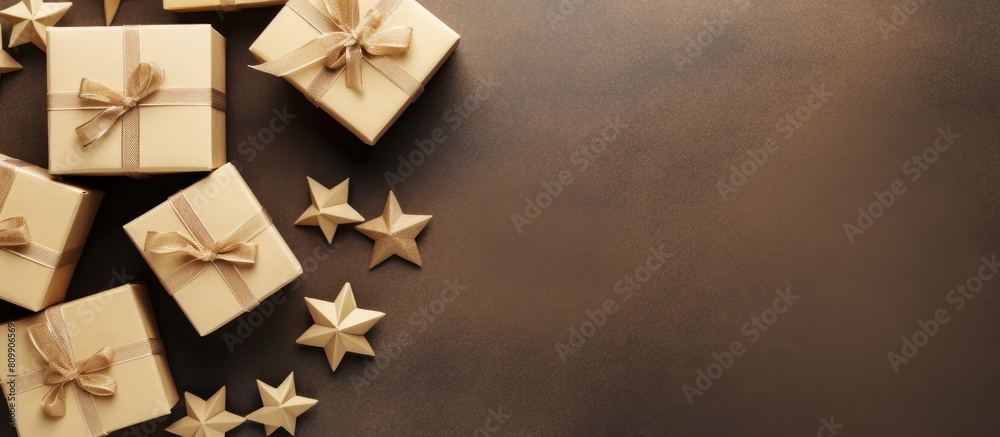 Poster Craft paper boxes top view on a Christmas background with a right sided copy space image