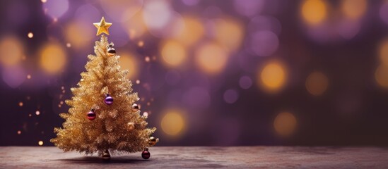 A Christmas tree adorned with golden lights creates a magical atmosphere while purple glitter bokeh...