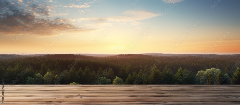 Poster evening view of a wood floor blending with the forest under a sky full of visual copy space