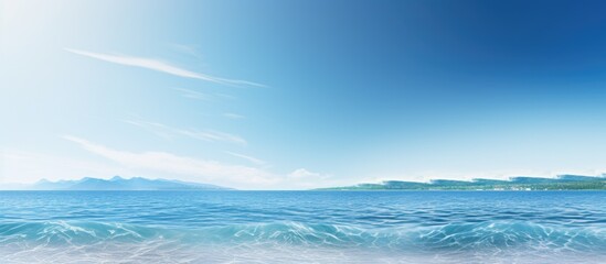 A serene background featuring the expansive sea and a clear blue sky with ample space for adding images or text