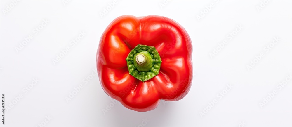 Fototapete Top view of a red sweet bell pepper isolated on a white background creating a perfect copy space image for your text with a flat lay composition