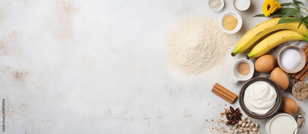 Aufkleber a top view of a white table displays a frame filled with cake ingredients including flour banana egg