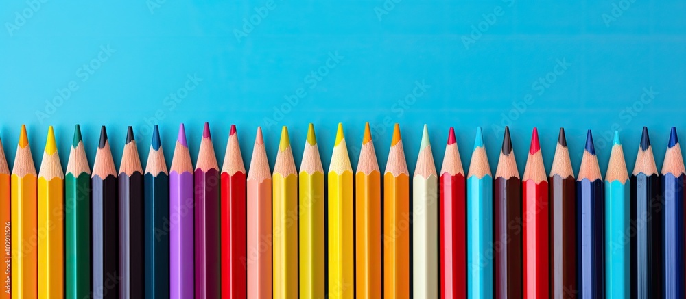 Poster a colorful background with pencils creates a creative education concept providing a copy space image