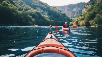 A group of individuals are paddling down a river in kayaks, enjoying a day of outdoor adventure.