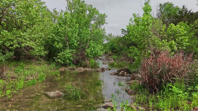 Scenic aerial view of Sculpture Falls via Barton Creek Greenbelt Trail in Austin Texas at summer