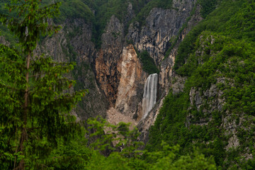 Boka waterfall the highest waterfall in Slovenia on a cloudy day. Natural background