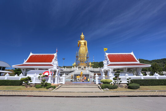 A giant golden Buddha named Phra Phuttha Mongkhon Maharat, built in 1999 to commemorate the 72nd birthday of His Majesty King Bhumibol popular attraction in Hat Yai, Thailand 