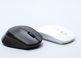 Black and white wireless pc mouse on a white background