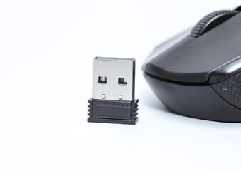 Wireless PC mouse with USB flash drive on a white background