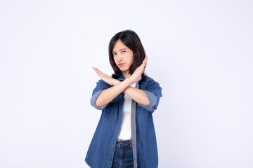 Asian woman wearing denim jean is making a gesture of denial on a white studio background.