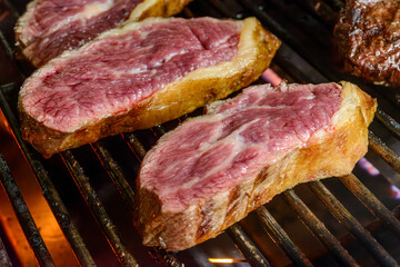 Barbecue of sliced picanha roasted over coals. This form of barbecue is widely consumed throughout Brazil.