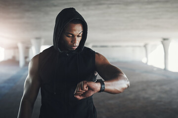 Black man, athlete and smart watch for exercise monitor in parking garage for heart rate, calories...