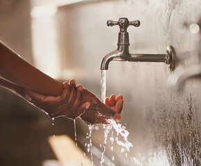 Woman, water and washing hands with tap from faucet in public bathroom for hygiene, bacteria and...