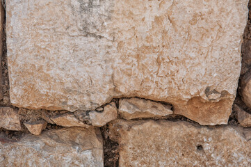 Ancient wall background with old concrete bricks