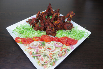 Chicken lollipops a Transformed into Flavorful Bites of Joy, Each Morsel Offering a Symphony of Juiciness and Succulence, A True Delight for the Senses and the Soul