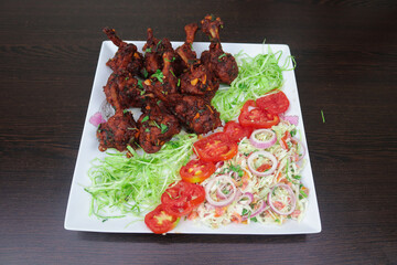 Chicken lollipops a Transformed into Flavorful Bites of Joy, Each Morsel Offering a Symphony of Juiciness and Succulence, A True Delight for the Senses and the Soul