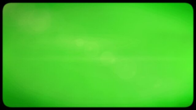 Effect of retro TV with kinescope on a green screen. Flickering light on the screen of an old TV. Rounded edges of the TV screen.