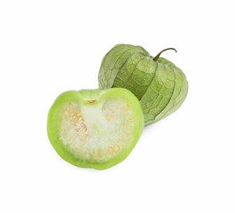 Fresh green tomatillos with husk isolated on white